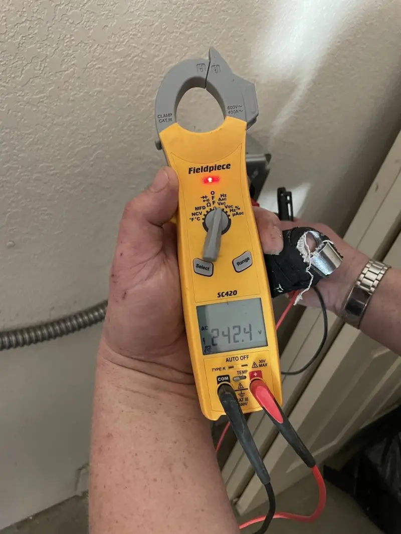 Voltage testing with clamp meter during Aluminum Wiring Replacement in Tonganoxie
